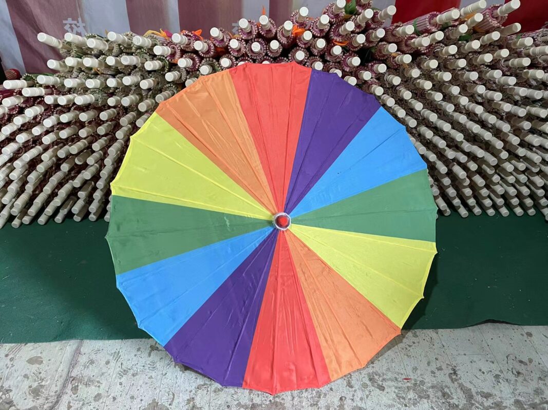 What is the use of the bamboo rainbow parasol?