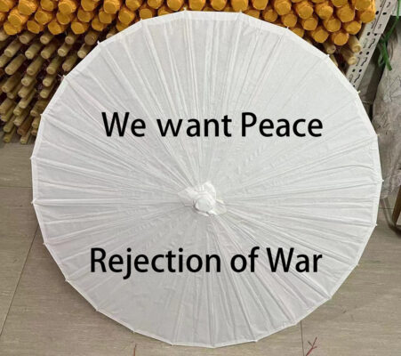 The paper parasol symbolizes peace and the rejection of war